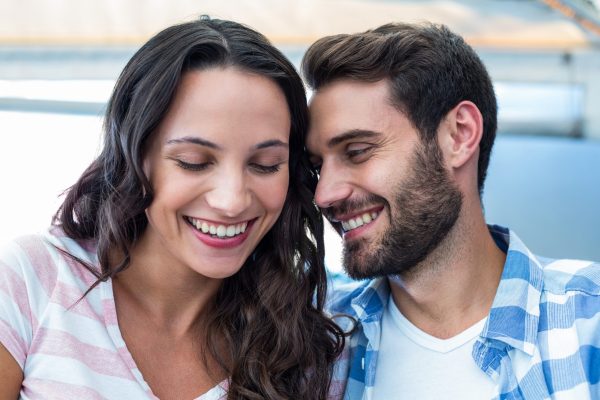 young-happy-couple-smiling-each-other